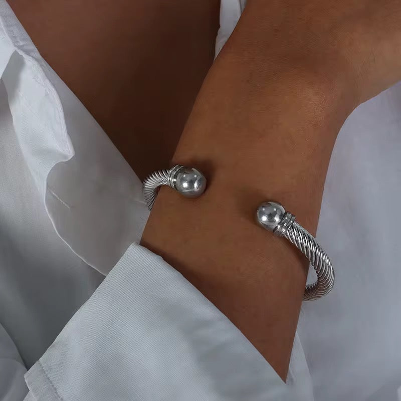 Twisted Silver Bangle